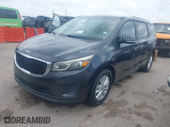 2015 Kia Sedona LX with VIN KNDMB5C16F6065437, listed as a IAAI auction lot 42079430 with 149,991 mi miles and . Bid and sale history available at DreamBid. Image 2.