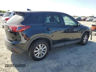 2016 Mazda CX-5 Touring z VIN JM3KE2CY5G0617516, wystawiony jako Copart lot #56421005 z przebiegiem 110 739 mil mil oraz Szkoda całkowita • Salvage title. Historia ofert i sprzedaży dostępna na DreamBid. Obrazek 3.