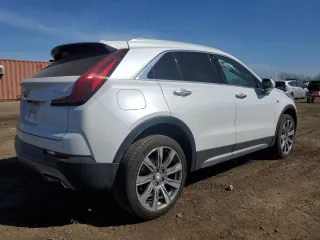 2019 Cadillac XT4 AWD Premium Luxury with VIN 1GYFZDR42KF182713, listed as a Copart auction lot 48633265 with 60,836 mi miles and Salvage title. Bid and sale history available at DreamBid. Image 3.