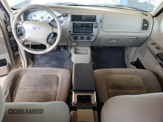 2004 Ford Explorer Sport Trac XLS with VIN 1FMZU67K14UC21140, listed as a Copart auction lot 57873115 with 131,040 mi miles and Clean title. Bid and sale history available at DreamBid. Image 8.