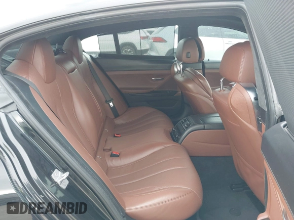 2014 BMW 6 Series 650i z VIN WBA6B2C55ED129419, wystawiony jako IAAI lot #39061341 z przebiegiem 68 790 mil mil oraz . Historia ofert i sprzedaży dostępna na DreamBid. Obrazek 8.