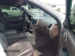 2014 Jeep Grand Cherokee Summit with VIN 1C4RJFJT6EC281114, listed as a IAAI auction lot 42497582 with 128,181 mi miles and . Bid and sale history available at DreamBid. Image 5.