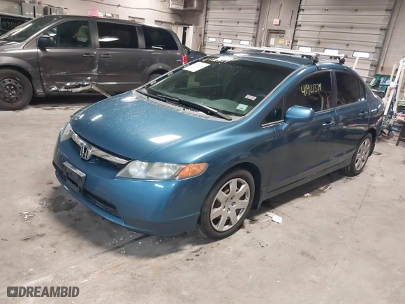 2007 Honda Civic Sdn LX with VIN 1HGFA16547L127957, listed as a IAAI auction lot 41921379 with 151,013 mi miles. Bid and sale history available at carsss.com. Image 17.