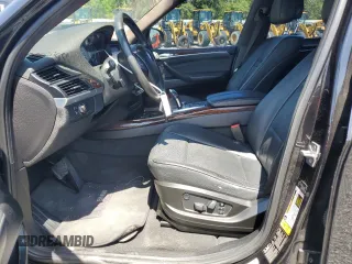 2011 BMW X5 35d with VIN 5UXZW0C58BL662048, listed as a Copart auction lot 52158795 with 166,291 mi miles and Salvage title. Bid and sale history available at DreamBid. Image 7.