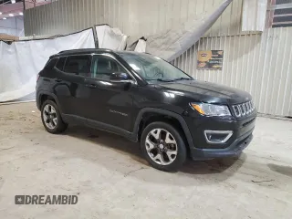 2018 Jeep Compass Limited with VIN 3C4NJDCBXJT399754, listed as a Copart auction lot 52698695 with 99,960 mi miles and Clean Title. Bid and sale history available at DreamBid. Image 4.