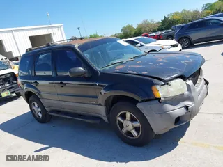 2001 Ford Escape XLT with VIN 1FMYU031X1KF31462, listed as a IAAI auction lot 41784891 with 372,527 mi miles. Bid and sale history available at carsss.com. Image 13.