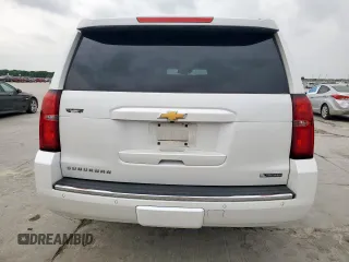 2018 Chevrolet Suburban Premier with VIN 1GNSCJKC5JR184384, listed as a Copart auction lot 53512255 with 161,503 mi miles and Salvage title. Bid and sale history available at DreamBid. Image 6.