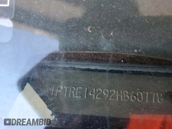 2002 Ford Econoline Cargo with VIN 1FTRE14292HB60778, listed as a Copart auction lot 74345234 with 173,366 mi miles and Salvage Title. Bid and sale history available at DreamBid. Image 13.
