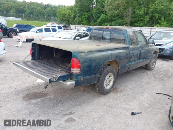 1998 Dodge Dakota SLT with VIN 1B7GL22X4WS554408, listed as a IAAI auction lot 42202021 with 147,765 mi miles. Bid and sale history available at carsss.com. Image 4.