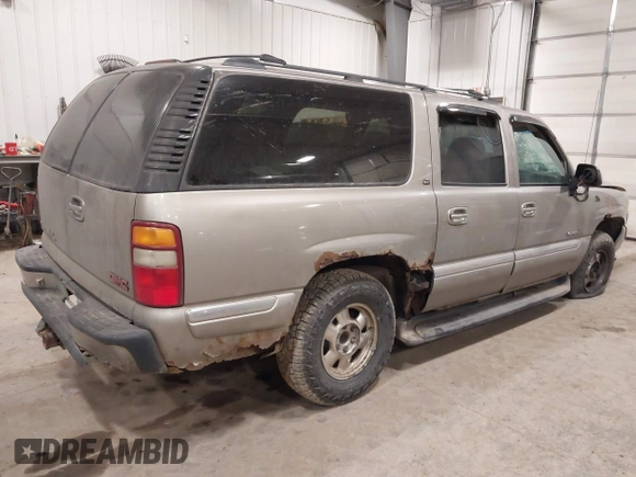 2000 GMC Yukon XL SLT with VIN 3GKFK16T7YG201904, listed as a IAAI auction lot 41704897 with 1 mi miles. Bid and sale history available at carsss.com. Image 4.