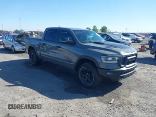 2023 Ram 1500 Rebel with VIN 1C6SRFLT2PN677577, listed as a IAAI auction lot 41991668 with 20,507 mi miles and . Bid and sale history available at DreamBid. Image 1.
