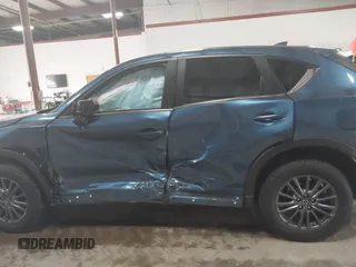 2019 Mazda CX-5 Touring with VIN JM3KFBCM1K0584369, listed as a IAAI auction lot 41657765 with 77,934 mi miles. Bid and sale history available at carsss.com. Image 14.