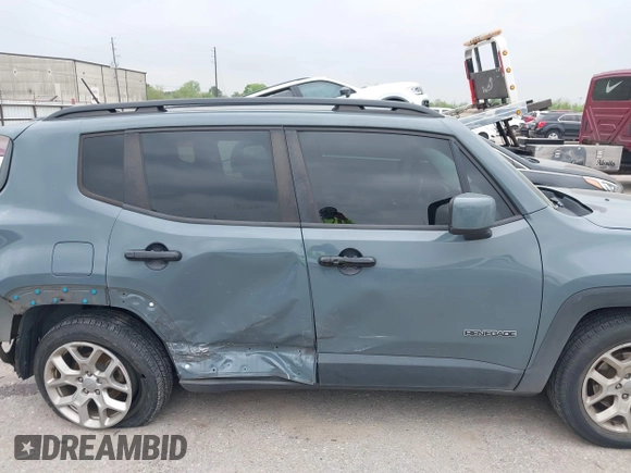 2017 Jeep Renegade Latitude with VIN ZACCJABB7HPG62825, listed as a IAAI auction lot 41919378 with 105,184 mi miles and . Bid and sale history available at DreamBid. Image 13.
