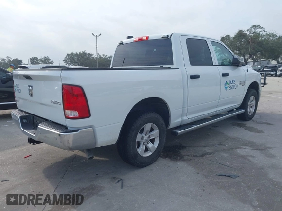 2022 Ram 1500 Tradesman with VIN 3C6RR7KG4NG331979, listed as a IAAI auction lot 41447852 with 14,201 mi miles and . Bid and sale history available at DreamBid. Image 4.