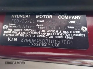 2001 Hyundai Elantra GLS z VIN KMHDN45D31U157064, wystawiony jako IAAI lot #41555447 z przebiegiem Nie podano mil oraz . Historia ofert i sprzedaży dostępna na DreamBid. Obrazek 9.