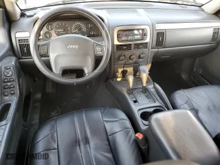 2002 Jeep Grand Cherokee Laredo with VIN 1J4GW48N32C180185, listed as a Copart auction lot 51988335 with 212,399 mi miles and Salvage Title. Bid and sale history available at carsss.com. Image 10.