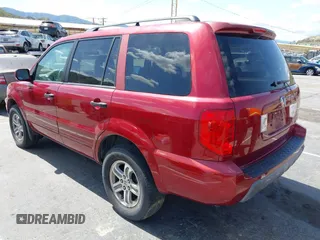 2005 Honda Pilot EX with VIN 2HKYF18495H526930, listed as a IAAI auction lot 41902628 with 128,055 mi miles. Bid and sale history available at carsss.com. Image 3.