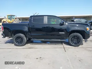 2022 GMC Canyon 2WD Elevation with VIN 1GTG5CEN5N1151794, listed as a IAAI auction lot 41876656 with 57,305 mi miles. Bid and sale history available at carsss.com. Image 14.