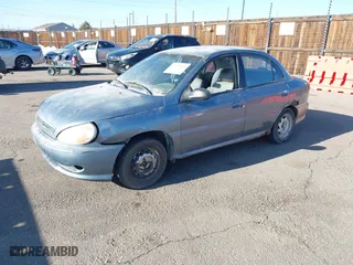 2001 Kia Rio with VIN KNADC123516046473, listed as a IAAI auction lot 41453919 with 193,582 mi miles. Bid and sale history available at carsss.com. Image 2.