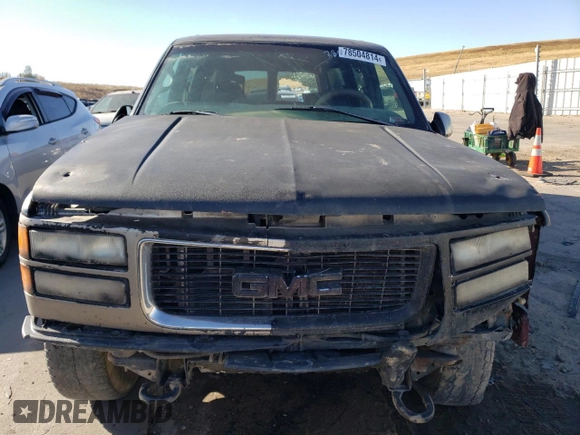 1997 GMC Suburban z VIN 3GKFK16R3VG511306, wystawiony jako Copart lot #78504814 z przebiegiem 287 079 mil mil oraz Szkoda całkowita • Salvage title. Historia ofert i sprzedaży dostępna na DreamBid. Obrazek 5.