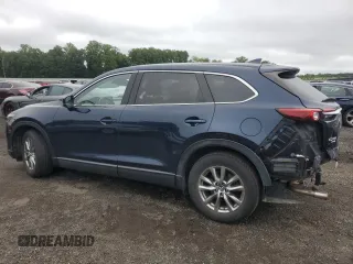 2018 Mazda CX-9 Touring with VIN JM3TCBCY8J0225549, listed as a Copart auction lot 61172975 with 89,969 mi miles and Salvage title. Bid and sale history available at DreamBid. Image 2.