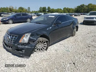 2014 Cadillac CTS Coupe Premium with VIN 1G6DH1E37E0123257, listed as a Copart auction lot 70986454 with 131,978 mi miles and Salvage Title. Bid and sale history available at carsss.com. Image 1.
