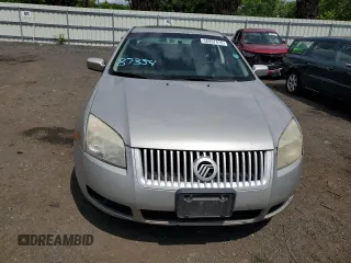 2007 Mercury Milan z VIN 3MEHM07Z07R662634, wystawiony jako Copart lot #58957415 z przebiegiem 212 079 mil mil oraz Szkoda całkowita • Salvage title. Historia ofert i sprzedaży dostępna na DreamBid. Obrazek 5.