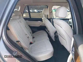 2014 BMW X5 xDrive35i z VIN 5UXKR0C52E0H19670, wystawiony jako IAAI lot #41909590 z przebiegiem 137 758 mil mil oraz . Historia ofert i sprzedaży dostępna na DreamBid. Obrazek 8.