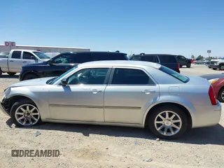 2007 Chrysler 300 with VIN 2C3KA43RX7H664582, listed as a IAAI auction lot 42106297 with 141,866 mi miles and . Bid and sale history available at DreamBid. Image 14.