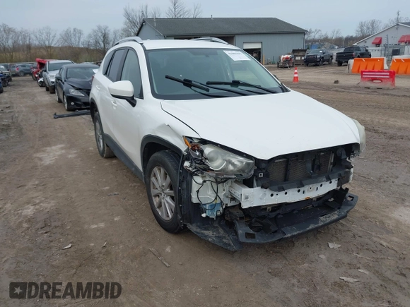 2014 Mazda CX-5 Sport with VIN JM3KE2BE8E0422322, listed as a IAAI auction lot 42009499 with 166,966 mi miles and . Bid and sale history available at carsss.com. Image 1.