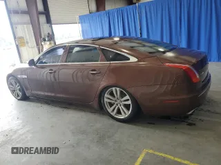 2011 Jaguar XJ XJL z VIN SAJWA2GB8BLV22081, wystawiony jako Copart lot #57088325 z przebiegiem 117 795 mil mil oraz Czysty tytuł • Clean title. Historia ofert i sprzedaży dostępna na DreamBid. Obrazek 2.