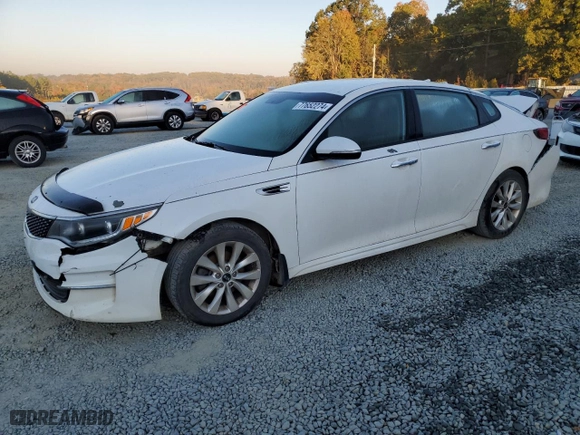 2016 Kia Optima EX with VIN 5XXGU4L31GG014286, listed as a Copart auction lot 77652274 with 126,885 mi miles and Salvage Title. Bid and sale history available at carsss.com. Image 1.