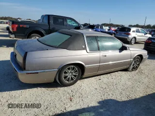 1996 Cadillac Eldorado z VIN 1G6EL12Y6TU613813, wystawiony jako Copart lot #78274114 z przebiegiem Nie podano mil oraz Szkoda całkowita • Salvage title. Historia ofert i sprzedaży dostępna na DreamBid. Obrazek 3.