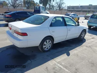 1998 Toyota Camry LE z VIN JT2BF22K9W0090879, wystawiony jako IAAI lot #41860538 z przebiegiem 248 879 mil mil oraz . Historia ofert i sprzedaży dostępna na DreamBid. Obrazek 4.