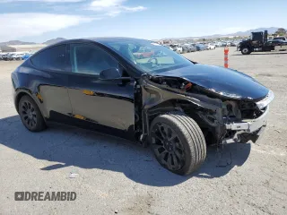 2024 Tesla Model Y Long Range z VIN 7SAYGAEE3RF089122, wystawiony jako Copart lot #52732035 z przebiegiem 15 486 mil mil oraz Szkoda całkowita • Salvage title. Historia ofert i sprzedaży dostępna na DreamBid. Obrazek 4.