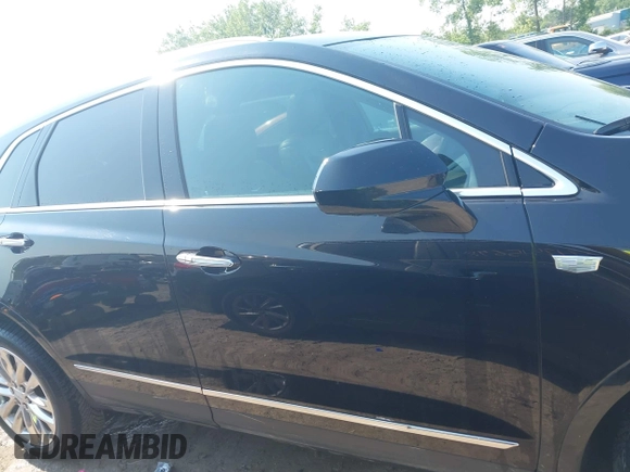 2017 Cadillac XT5 Platinum AWD with VIN 1GYKNFRS6HZ130626, listed as a IAAI auction lot 42470536 with 128,129 mi miles and . Bid and sale history available at DreamBid. Image 13.