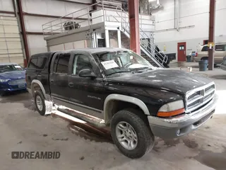 2001 Dodge Dakota z VIN 1B7GG2AX61S202929, wystawiony jako IAAI lot #41381068 z przebiegiem 107 561 mil mil oraz . Historia ofert i sprzedaży dostępna na DreamBid. Obrazek 1.