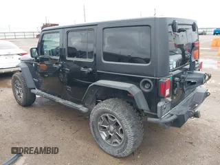2012 Jeep Wrangler Unlimited Rubicon with VIN 1C4HJWFGXCL142804, listed as a IAAI auction lot 42183960 with 124,392 mi miles and . Bid and sale history available at DreamBid. Image 3.