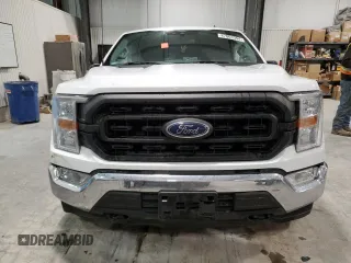 2022 Ford F-150 XL with VIN 1FTFX1E55NKD39753, listed as a Copart auction lot 87063394 with 50,191 mi miles and Salvage title. Bid and sale history available at DreamBid. Image 5.