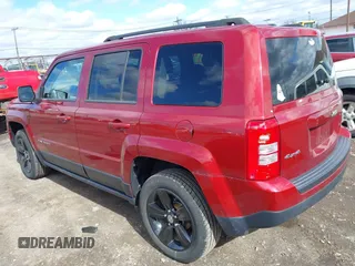 2014 Jeep Patriot Latitude with VIN 1C4NJRFB4ED897890, listed as a IAAI auction lot 41978399 with 76,688 mi miles. Bid and sale history available at carsss.com. Image 3.