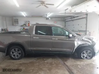 2020 Honda Ridgeline RTL-E with VIN 5FPYK3F75LB001516, listed as a IAAI auction lot 41605859 with 93,902 mi miles. Bid and sale history available at carsss.com. Image 13.