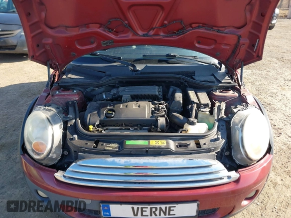 2009 MINI Cooper Hardtop with VIN WMWMF33509TU71339, listed as a IAAI auction lot 41777908 with 155,698 mi miles. Bid and sale history available at carsss.com. Image 10.