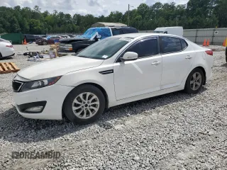 2014 Kia Optima LX with VIN 5XXGM4A7XEG307168, listed as a Copart auction lot 61019545 with 196,913 mi miles and Salvage title. Bid and sale history available at DreamBid. Image 1.
