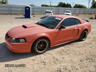 2004 Ford Mustang GT Deluxe z VIN 1FAFP42X64F105318, wystawiony jako Copart lot #73853084 z przebiegiem 168 450 mil mil oraz Szkoda całkowita • Salvage title. Historia ofert i sprzedaży dostępna na DreamBid. Obrazek 1.