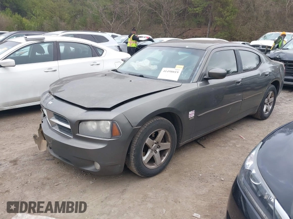 2010 Dodge Charger SXT with VIN 2B3CA3CV5AH118174, listed as a IAAI auction lot 41498019 with 336,323 mi miles. Bid and sale history available at carsss.com. Image 2.