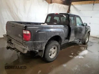 2002 Ford Ranger with VIN 1FTZR15U52PA08409, listed as a Copart auction lot 87858015 with 128,892 mi miles and Salvage Title. Bid and sale history available at DreamBid. Image 3.