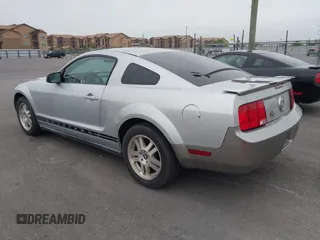 2007 Ford Mustang Deluxe with VIN 1ZVFT80N275331507, listed as a IAAI auction lot 42120778 with 117,021 mi miles. Bid and sale history available at carsss.com. Image 3.