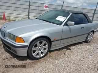 1998 BMW 3 Series 323icA with VIN WBABJ8334WEM22565, listed as a IAAI auction lot 41927799 with 165,077 mi miles. Bid and sale history available at carsss.com. Image 2.