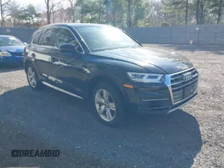 2018 Audi Q5 Premium Plus with VIN WA1BNAFY2J2248778, listed as a IAAI auction lot 42055696 with 100,679 mi miles. Bid and sale history available at carsss.com. Image 1.