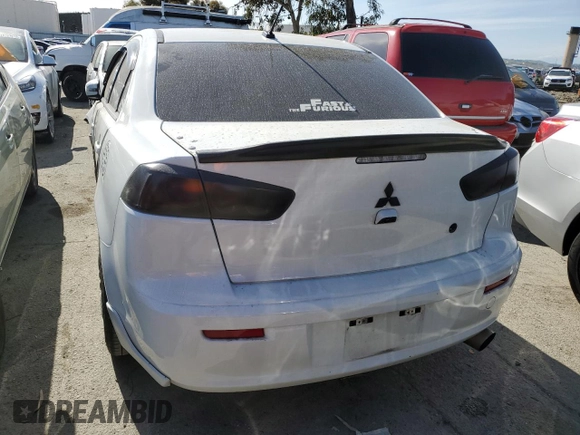 2015 Mitsubishi Lancer GT with VIN JA32U8FW6FU021295, listed as a Copart auction lot 48764453 with 104,724 mi miles. Bid and sale history available at carsss.com. Image 6.